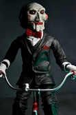 Saw figurine sonore billy with tricycle 30 cm