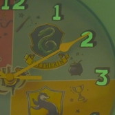 Harry potter - les 4 maisons - horloge murale 'phosphorescent'