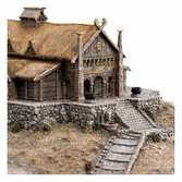 Le seigneur des anneaux statuette the golden hall of edoras 9 cm